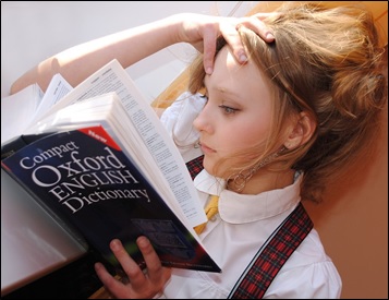 Vocabulary Practice Doesn’t Have to be Boring! Girl Reading Dictionary